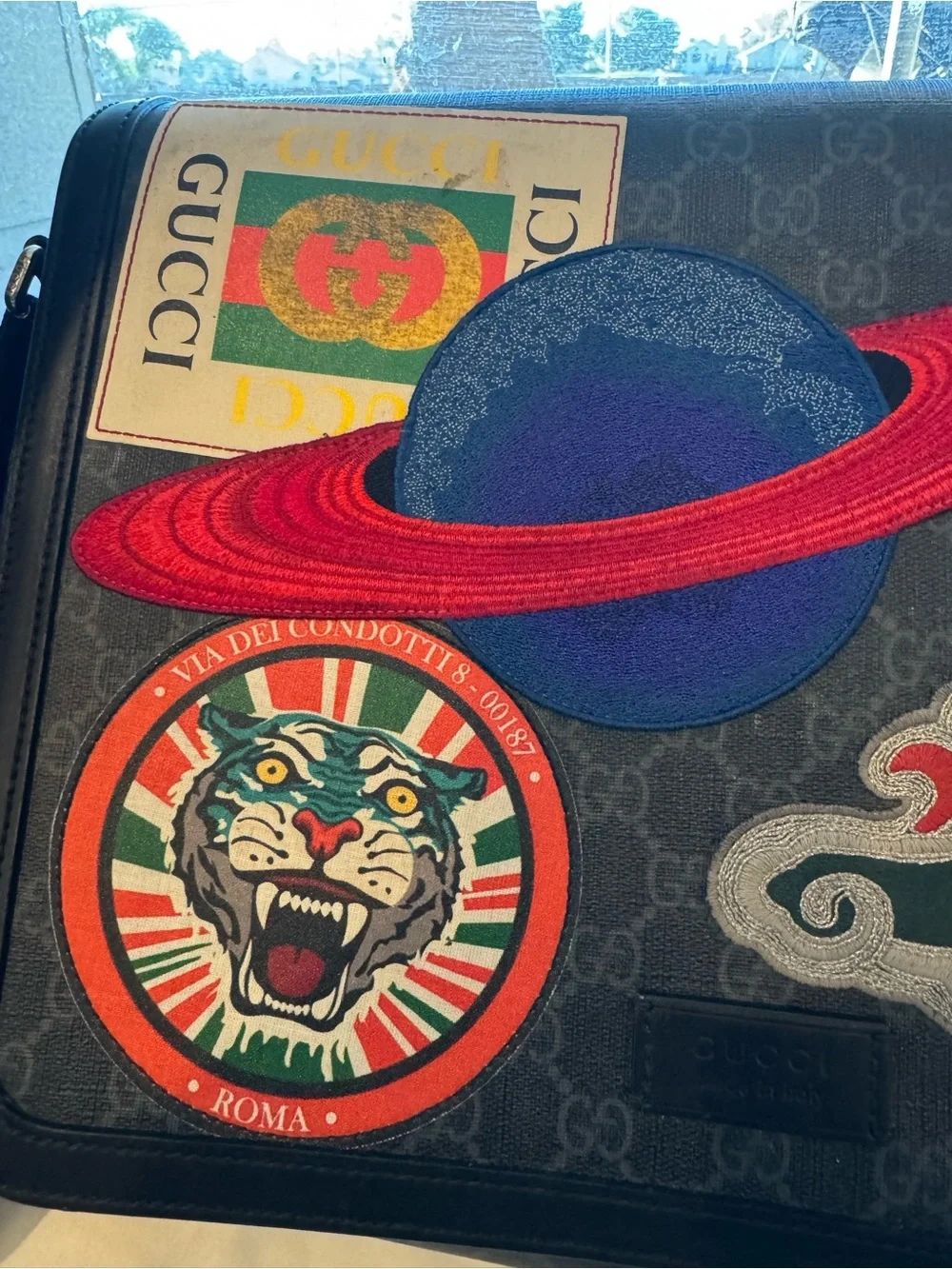 Gucci Navy GG Supreme Messenger Bag with Multicolor Planet & Patch Accents